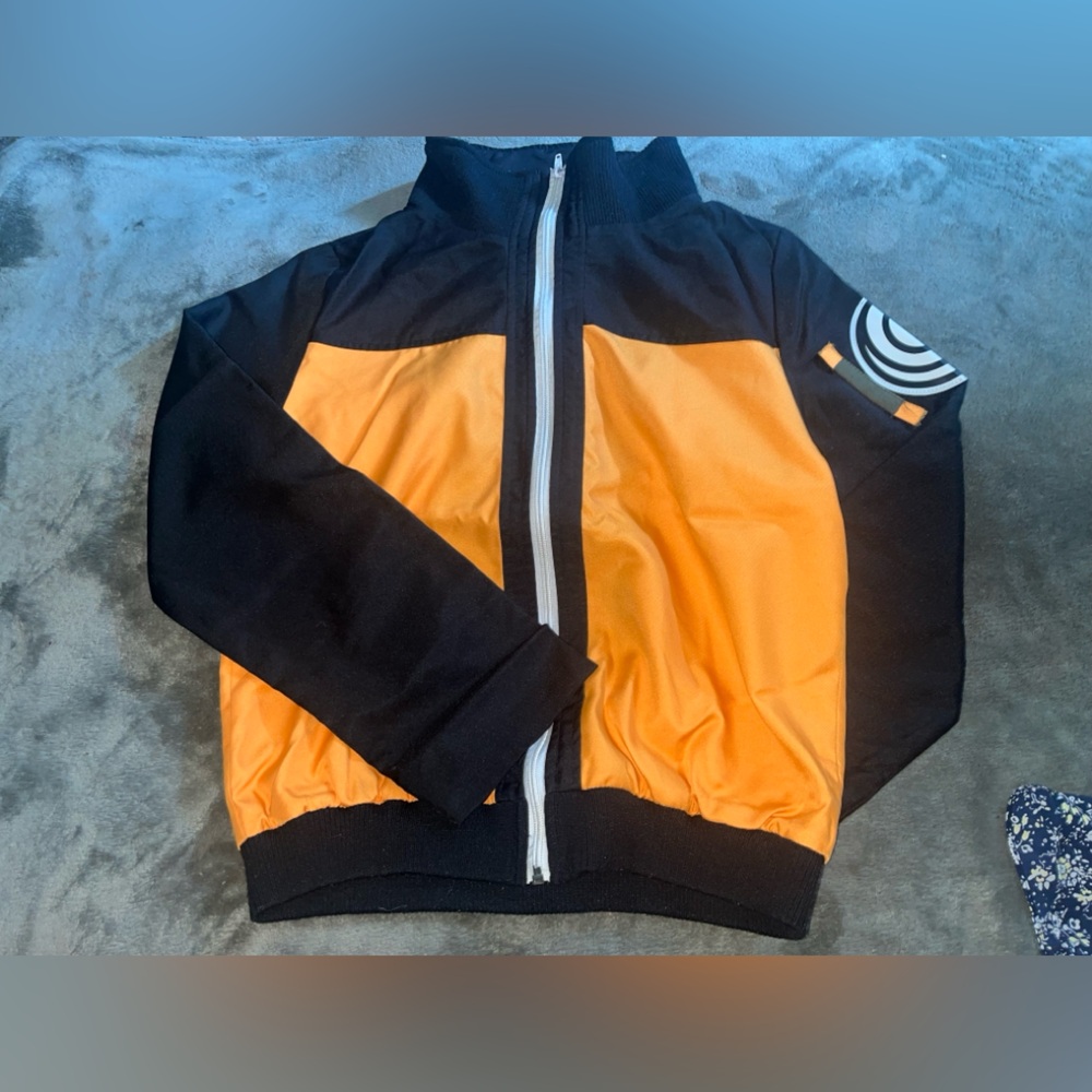 Source Unknown Black and Orange Windbreaker size small. nWOt